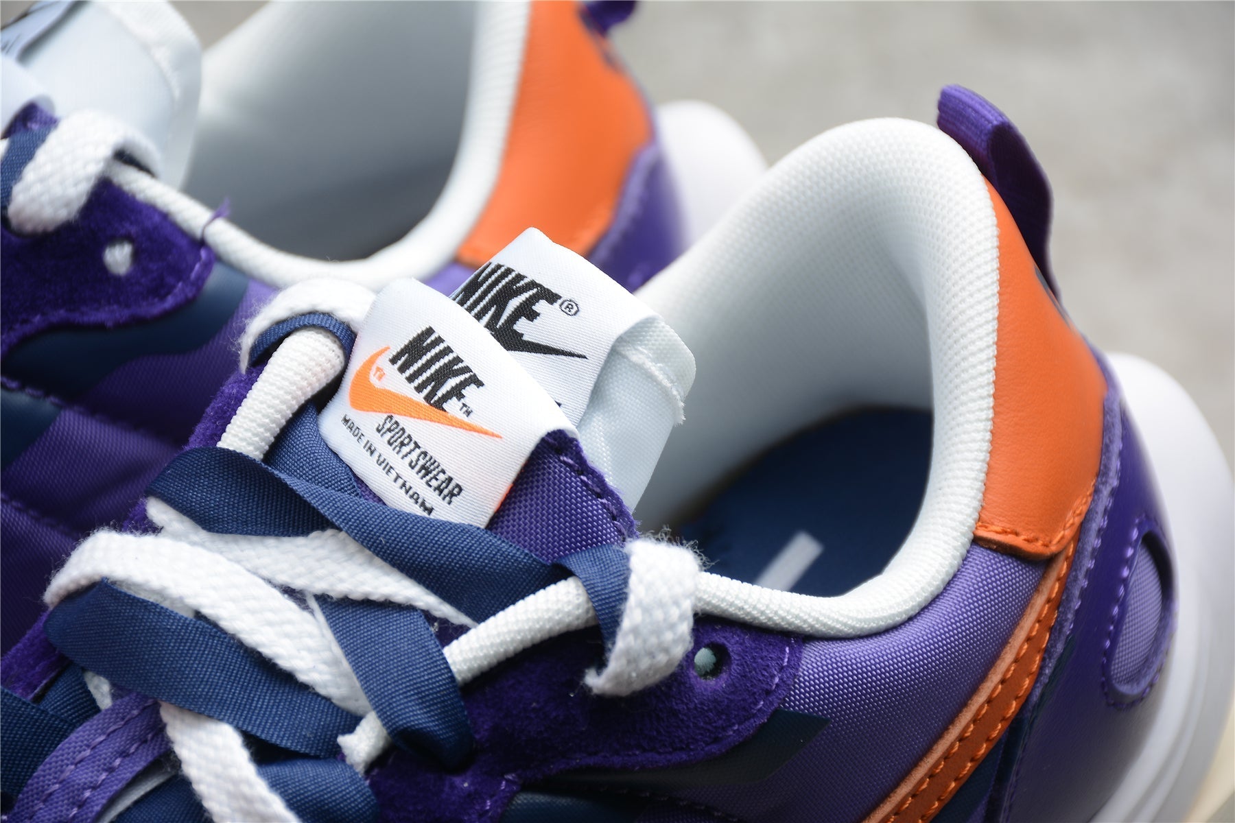 Nike x sacai VaporWaffle Purple / Orange