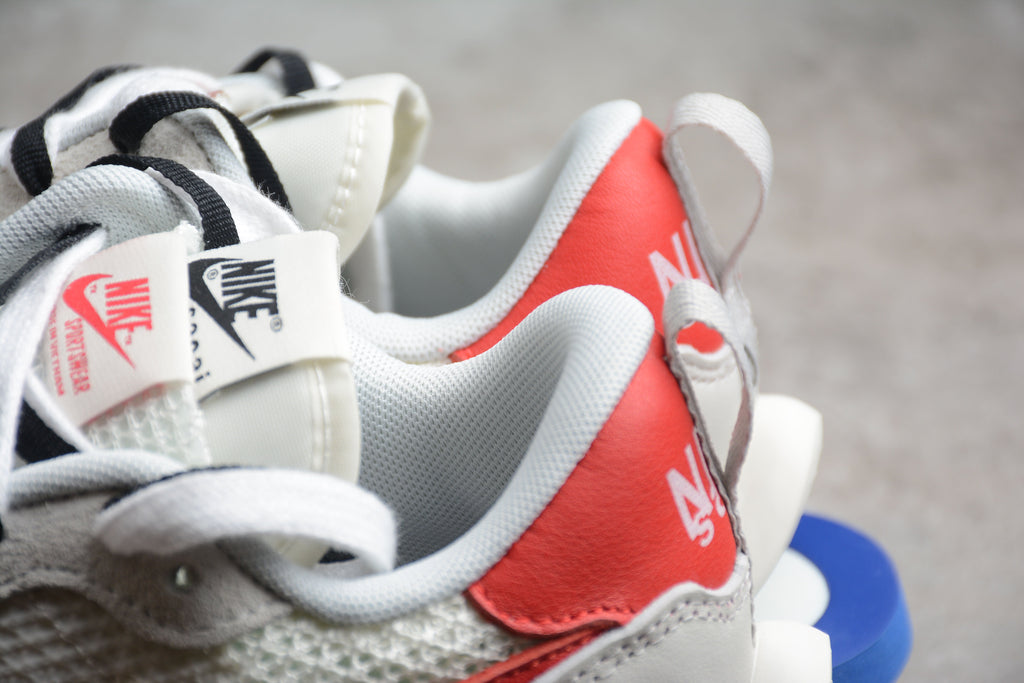 Nike x sacai VaporWaffle Sport Fuchsia / Game Royal